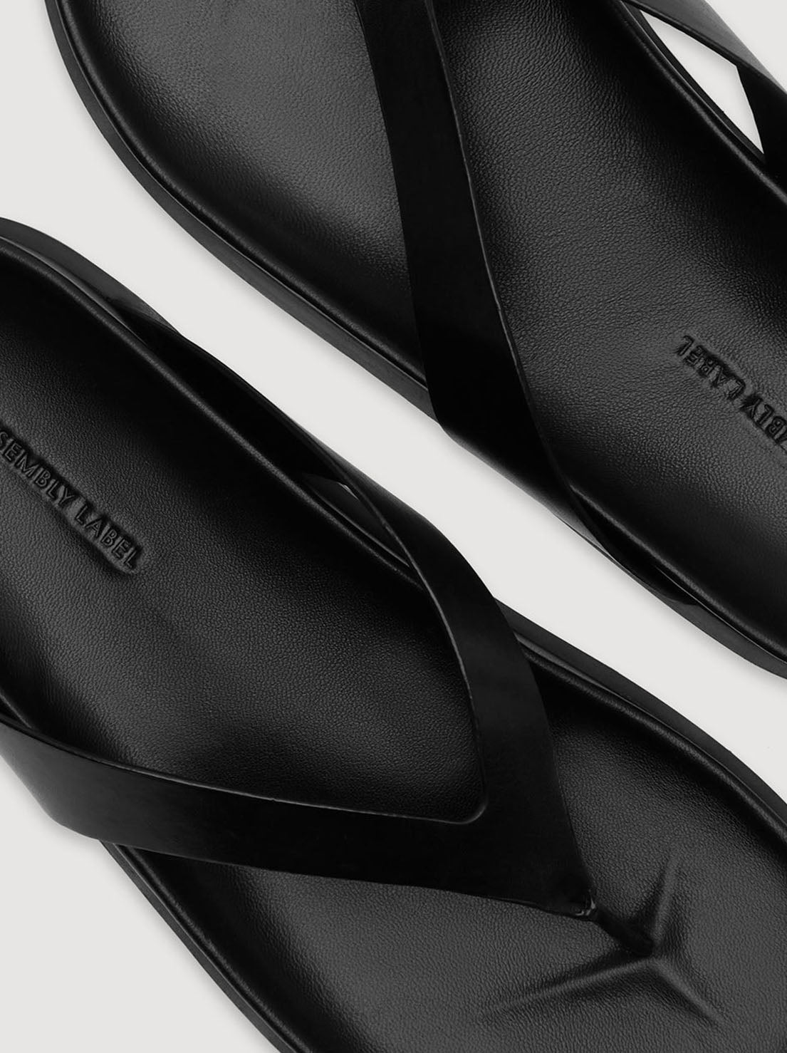 Assembly Label - Mela Leather Thong - Black