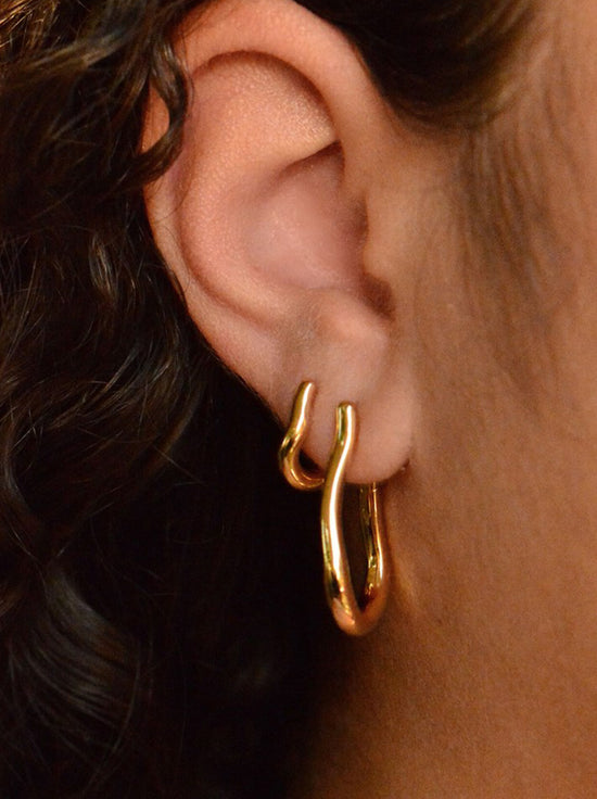 Linda Tahija - Curve Huggie Earrings - Gold Plated