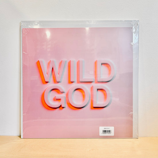 Nick Cave & The Bad Seeds - Wild God. LP [Ltd. Ed. Clear Vinyl w. 12" Album Print]