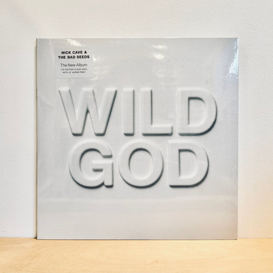 Nick Cave & The Bad Seeds - Wild God. LP [Ltd. Ed. Clear Vinyl w. 12" Album Print]