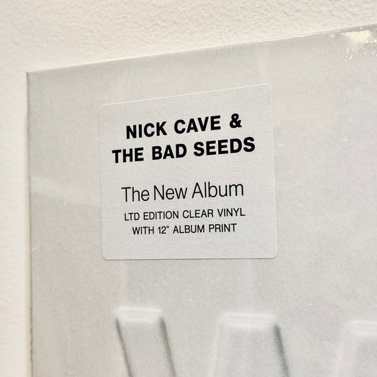 Nick Cave & The Bad Seeds - Wild God. LP [Ltd. Ed. Clear Vinyl w. 12" Album Print]