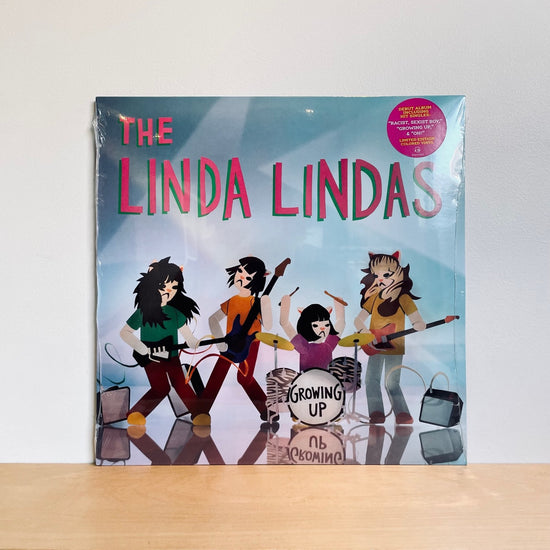 The Linda Lindas - Growing Up. LP [Limited Clear Blue/Pink Splatter Vinyl]